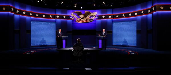 El primer debate presidencial entre Donald Trump y Joe Biden - Sputnik Mundo