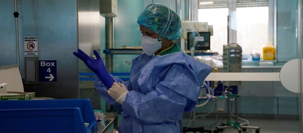 Una enfermera española - Sputnik Mundo