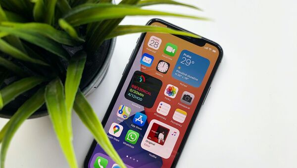 El sistema operativo iOS 14 - Sputnik Mundo