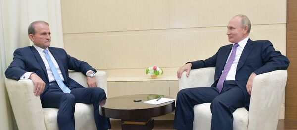 El presidente de Rusia, Vladímir Putin, y el líder del partido ucraniano, Víctor Medvedchuk - Sputnik Mundo