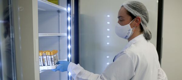 Una enfermera colombiana - Sputnik Mundo