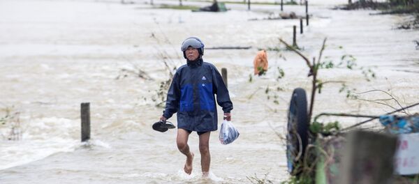 Inundaciones que azotaron las regiones centrales de Vietnam Inundaciones que azotaron las regiones centrales de Vietnam - Sputnik Mundo