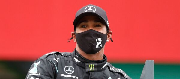 Lewis Hamilton tras ganar el Gran Premio de Portugal, Portimao, el 25 de octubre - Sputnik Mundo