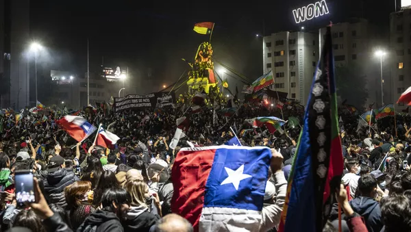 Demonstrators supporting the reform of the Chilean constitution celebrate
