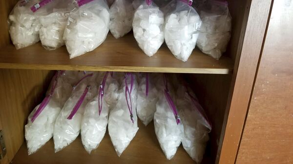 Metanfetamina en paquetes, imagen referencial - Sputnik Mundo