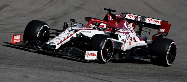 Bólido de Alfa Romeo pilotado por Kimi Raikkonen - Sputnik Mundo