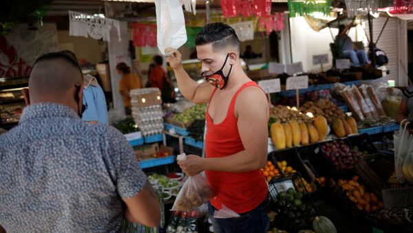 Trabajador de un mercado de Ciudad Juarez - Sputnik Mundo