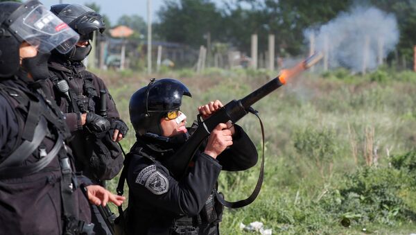 Operativo de desalojo de tierras tomadas en Guernica, Buenos Aires - Sputnik Mundo