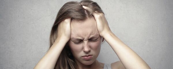 Dolor de cabeza (imagen referencial) - Sputnik Mundo