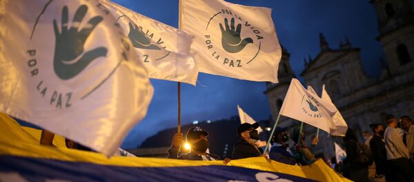Marcha de los excombatientes de las FARC en Bogotá - Sputnik Mundo