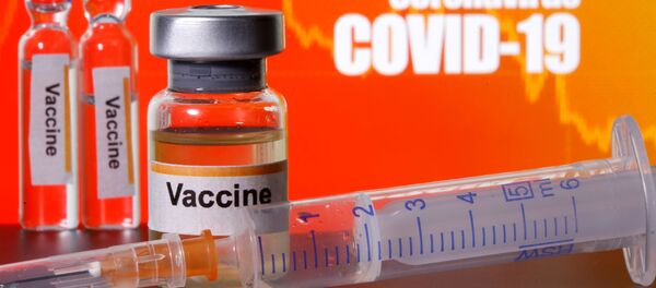 Una vacuna contra el COVID-19 (imagen referencial) - Sputnik Mundo