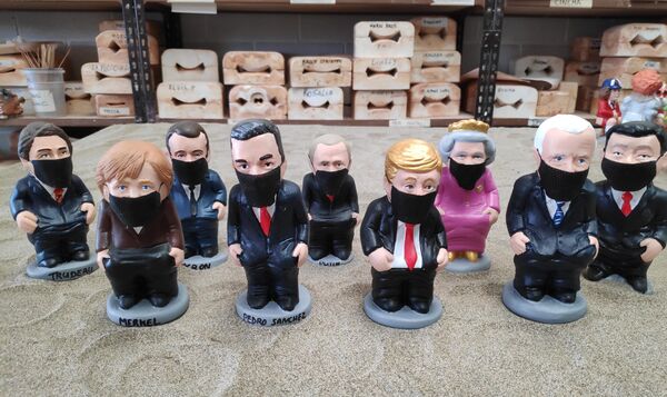 Fernando Simón y Ansu Fati se transforman en 'caganers' Fernando Simón y Ansu Fati se transforman en 'caganers' - Sputnik Mundo