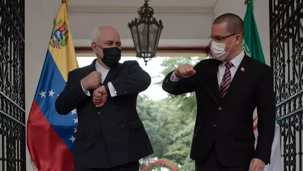 El Ministro de Relaciones Exteriores de Irán, Mohammad Javad Zarif, con su homólogo venezolano, Jorge Arreaza - Sputnik Mundo