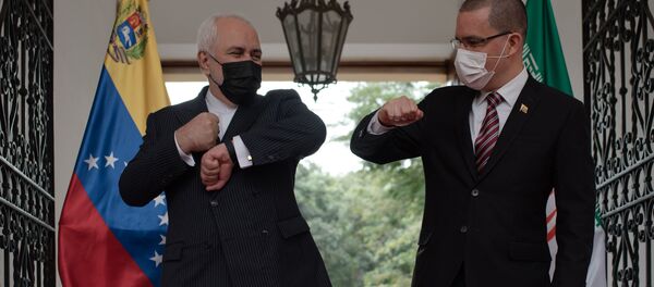 El Ministro de Relaciones Exteriores de Irán, Mohammad Javad Zarif, con su homólogo venezolano, Jorge Arreaza - Sputnik Mundo