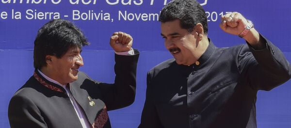 El expresidente de Bolivia, Evo Morales, junto al presidente de Venezuela, Nicolás Maduro - Sputnik Mundo