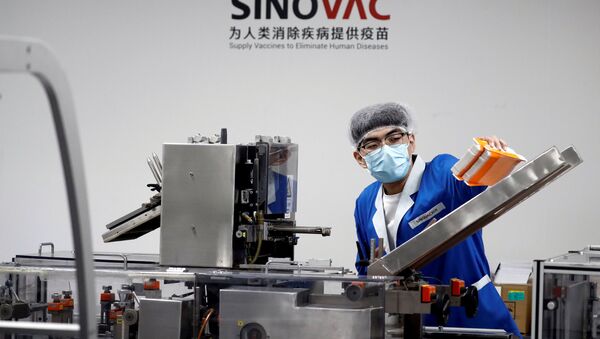 Empaquetado de la vacuna china Coronavac - Sputnik Mundo