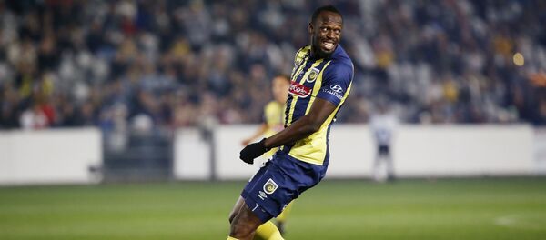 El excorredor Usain Bolt en un partido de fútbol (archivo) El excorredor Usain Bolt en un partido de fútbol (archivo) - Sputnik Mundo