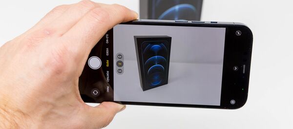 Un iPhone 12 Pro Max - Sputnik Mundo