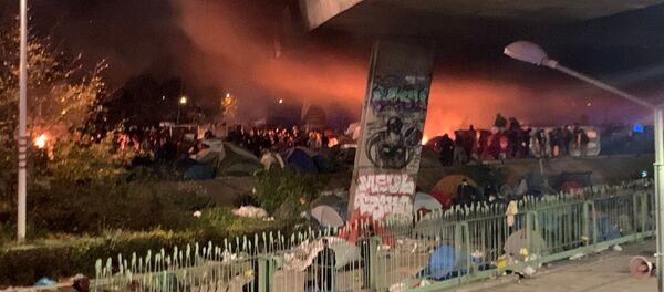 Desalojo de un campamento ilegal al norte de París Desalojo de un campamento ilegal al norte de París - Sputnik Mundo