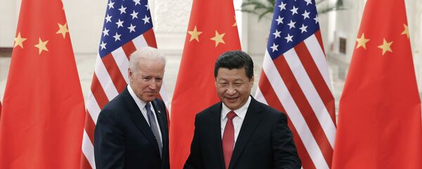 El presidente chino, Xi Jinping con su homólogo de EEUU, Joe Biden - Sputnik Mundo