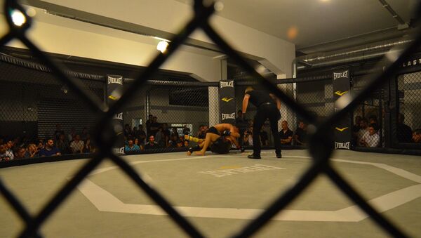 Un combate de MMA  - Sputnik Mundo
