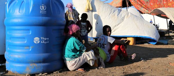 Refugiados etíopes que huyen de Tigray - Sputnik Mundo