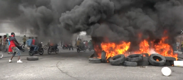 Asesinado a tiros: Haití vive violentas protestas antigubernamentales - Sputnik Mundo