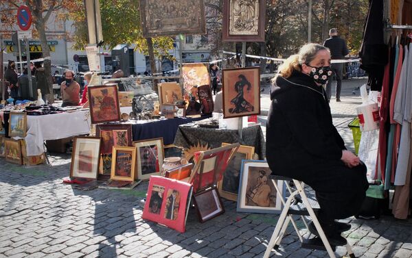 Una tendera del Rastro de Madrid - Sputnik Mundo