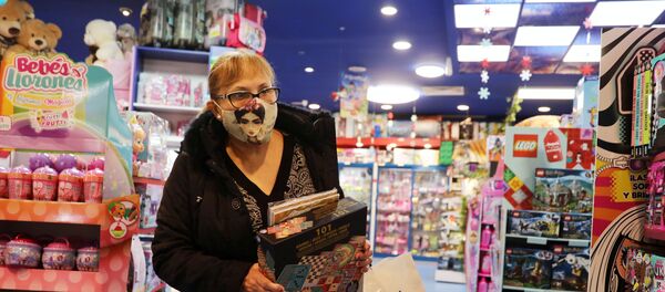 Compras navideñas durante la pandemia de COVID-19 en España - Sputnik Mundo