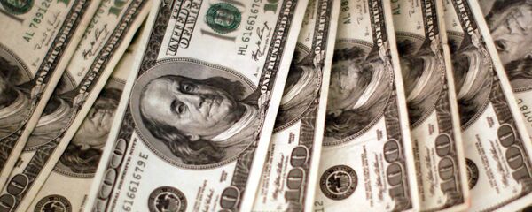 Dólares estadounidenses (imagen referencial) - Sputnik Mundo