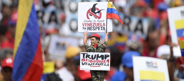 Manifestación en apoyo al presidente Nicolás Maduro y en contra del imperialismo estadounidense. Caracas,  31 de agosto de 2019. - Sputnik Mundo