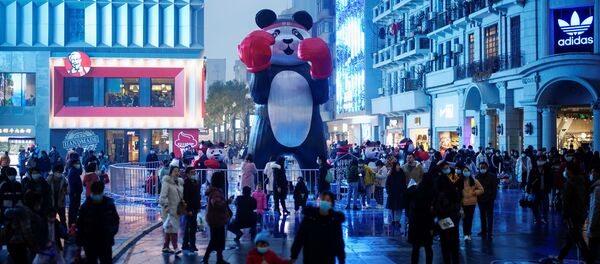Gente en las calles de Wuhan, China (diciembre de 2020) - Sputnik Mundo