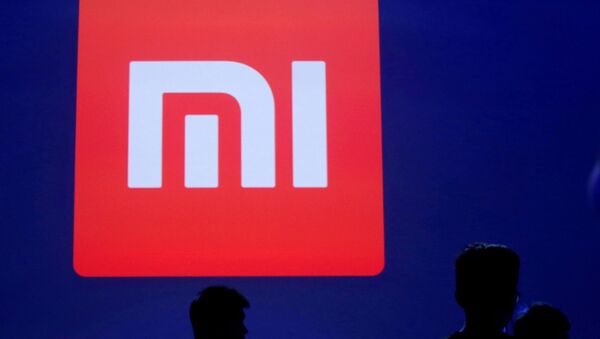 Logo de Xiaomi (imagen referencial) - Sputnik Mundo