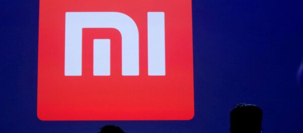 Logo de Xiaomi (imagen referencial) - Sputnik Mundo