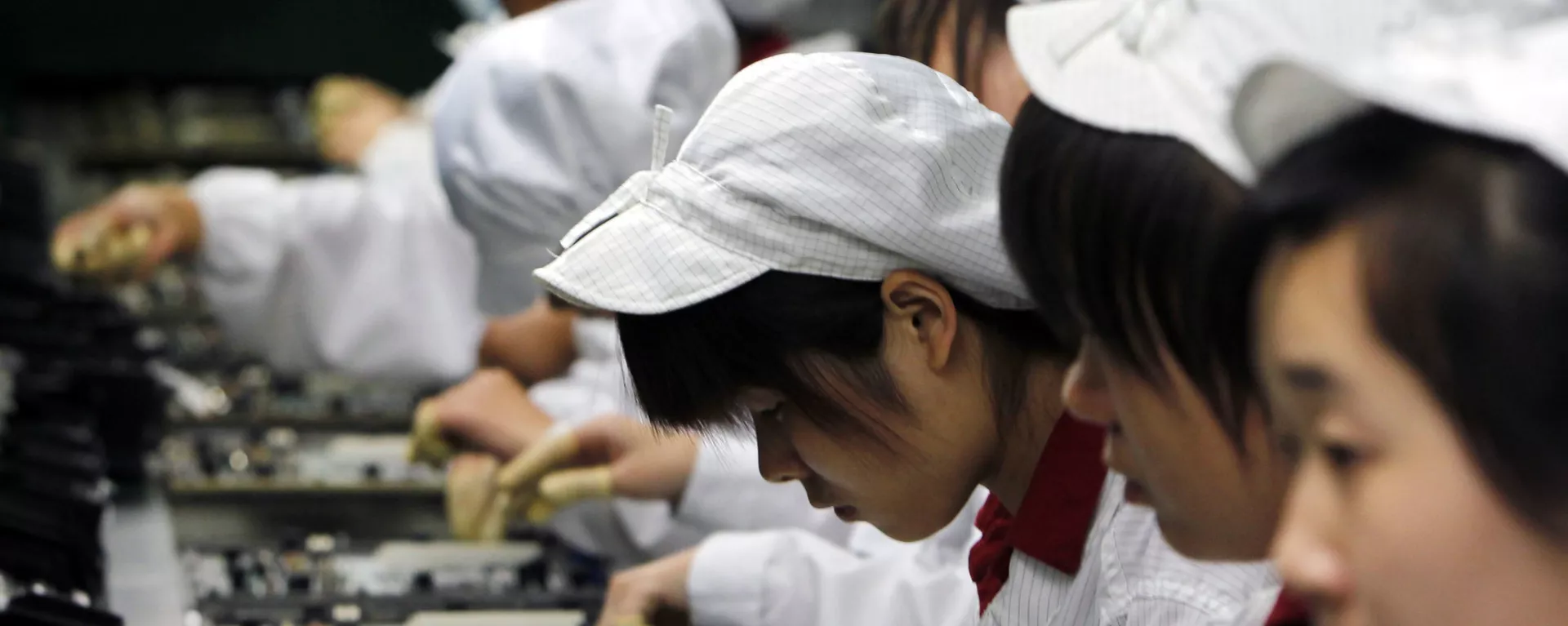 Trabajadores de la fábrica Foxconn en China (archivo) - Sputnik Mundo, 1920, 09.06.2025