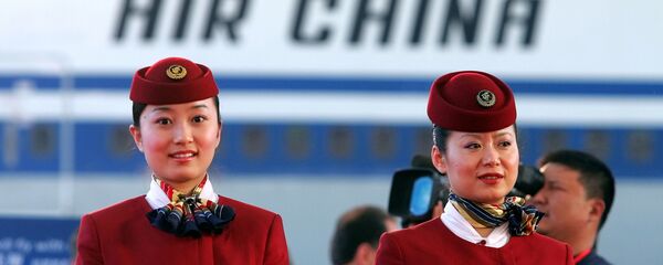 Unas azafatas de la aerolínea china Air China - Sputnik Mundo