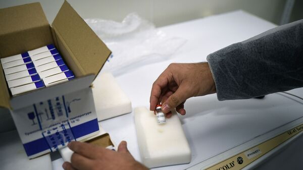 Cajas con la vacuna rusa Sputnik V contra COVID-19 - Sputnik Mundo