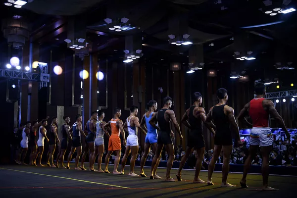 El culturismo apareció en China en 1957. En ese momento, el Gobierno invitó al presidente de la Federación Internacional de Fisicoculturismo Ben Weider —hermano del legendario 'bodybuilder' Joe Weider—, para entrenar a los atletas chinos para los Juegos Olímpicos. El culturismo apareció en China en 1957. En ese momento, el Gobierno invitó al presidente de la Federación Internacional de Fisicoculturismo Ben Weider —hermano del legendario 'bodybuilder' Joe Weider—, para entrenar a los atletas chinos para los Juegos Olímpicos. - Sputnik Mundo