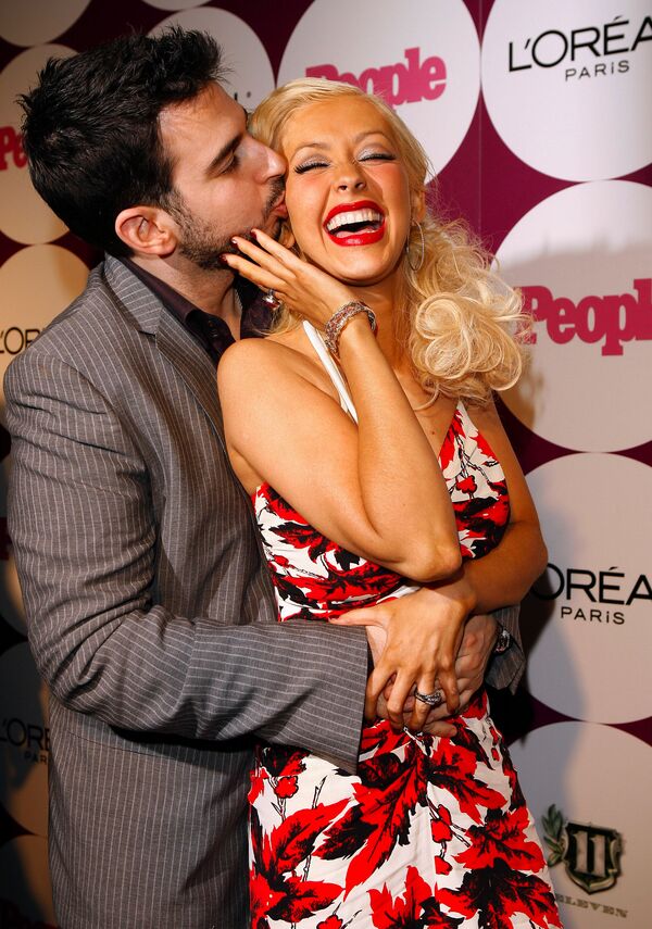 Christina Aguilera con su esposo Jordan Bratman en Los Ángeles, 2006. Christina Aguilera con su esposo Jordan Bratman en Los Ángeles, 2006. - Sputnik Mundo