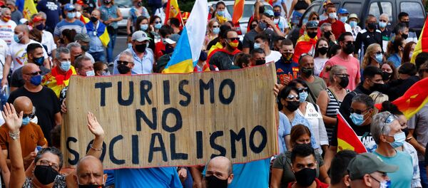 Protesta contra migrantes en Gran Canaria - Sputnik Mundo