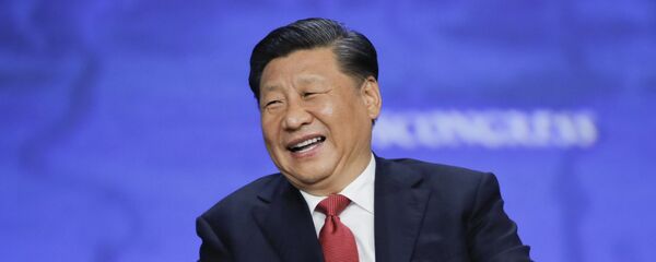 Xi Jinping, presidente de China, sonriendo - Sputnik Mundo