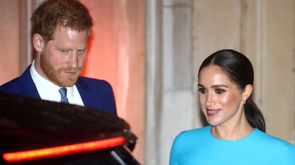 El príncipe Harry y su esposa Meghan - Sputnik Mundo