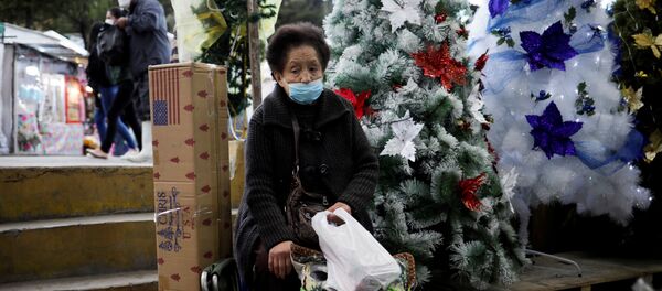 Mujer con tapabocas en La Paz, Bolivia - Sputnik Mundo