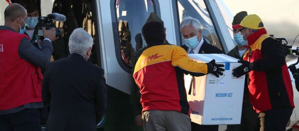 Llegada de las primeras dosis de la vacuna Pfizer contra coronavirus - Sputnik Mundo