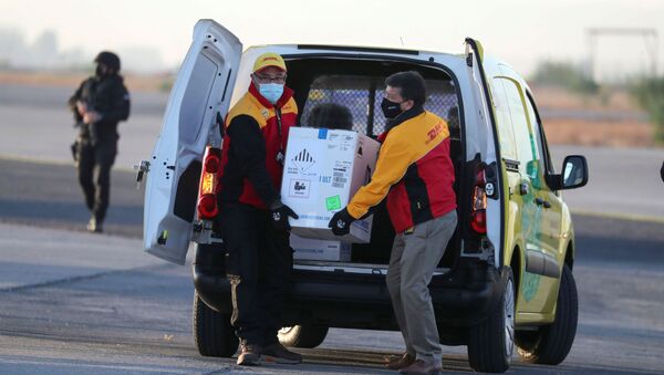 Llegada de las primeras dosis de la vacuna Pfizer contra coronavirus - Sputnik Mundo