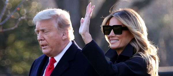 El presidente de EEUU, Donald Trump, junto a su mujer Melania - Sputnik Mundo