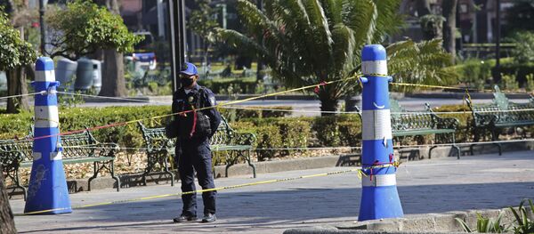 Un agente de Policía en México - Sputnik Mundo