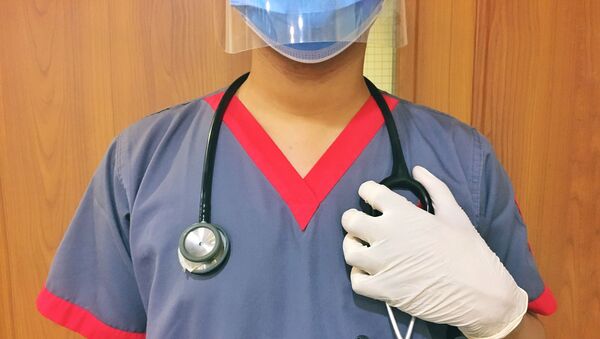 Un profesional de la salud - Sputnik Mundo