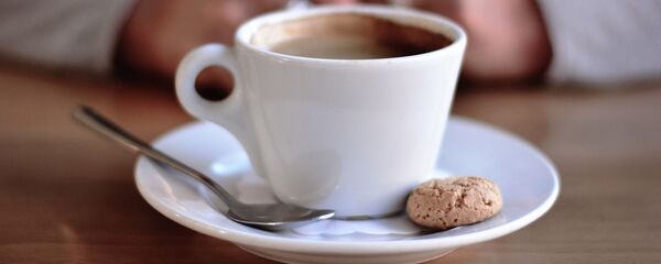 Una taza de café - Sputnik Mundo