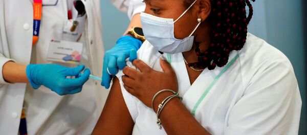 Vacunación contra el coronavirus en Madrid, España - Sputnik Mundo